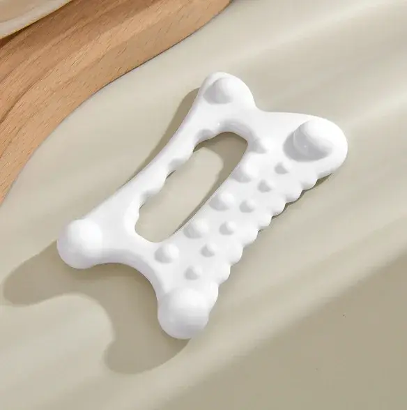 Planche de massage Gua Sha pour le visage