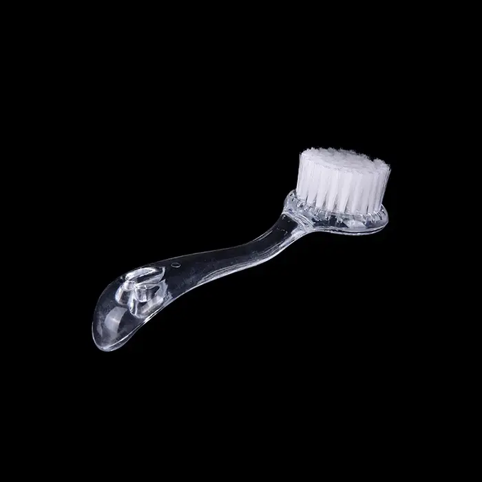 Brosse nettoyante et exfoliante en plastique pour le lavage du visage