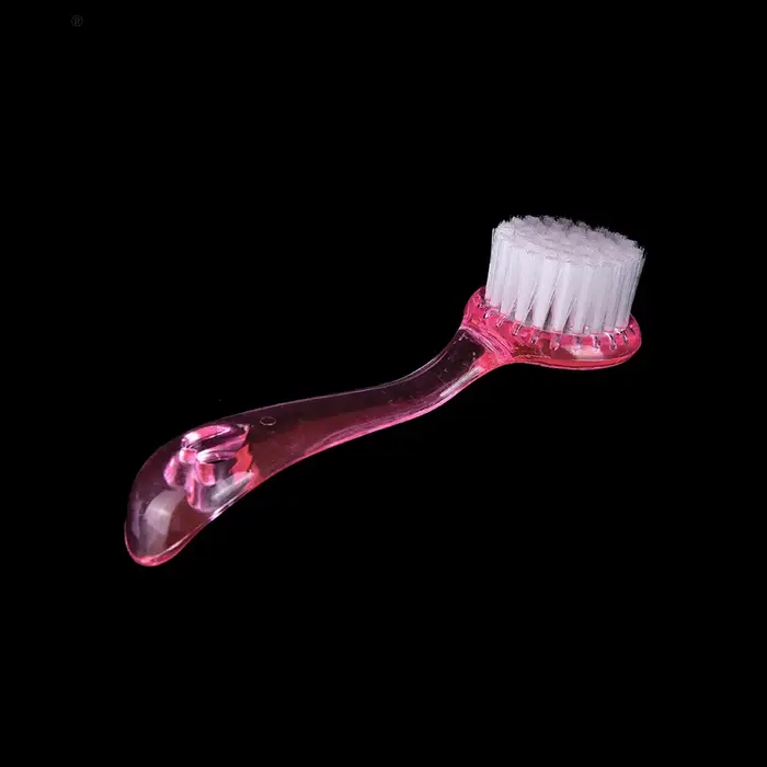 Brosse nettoyante et exfoliante en plastique pour le lavage du visage